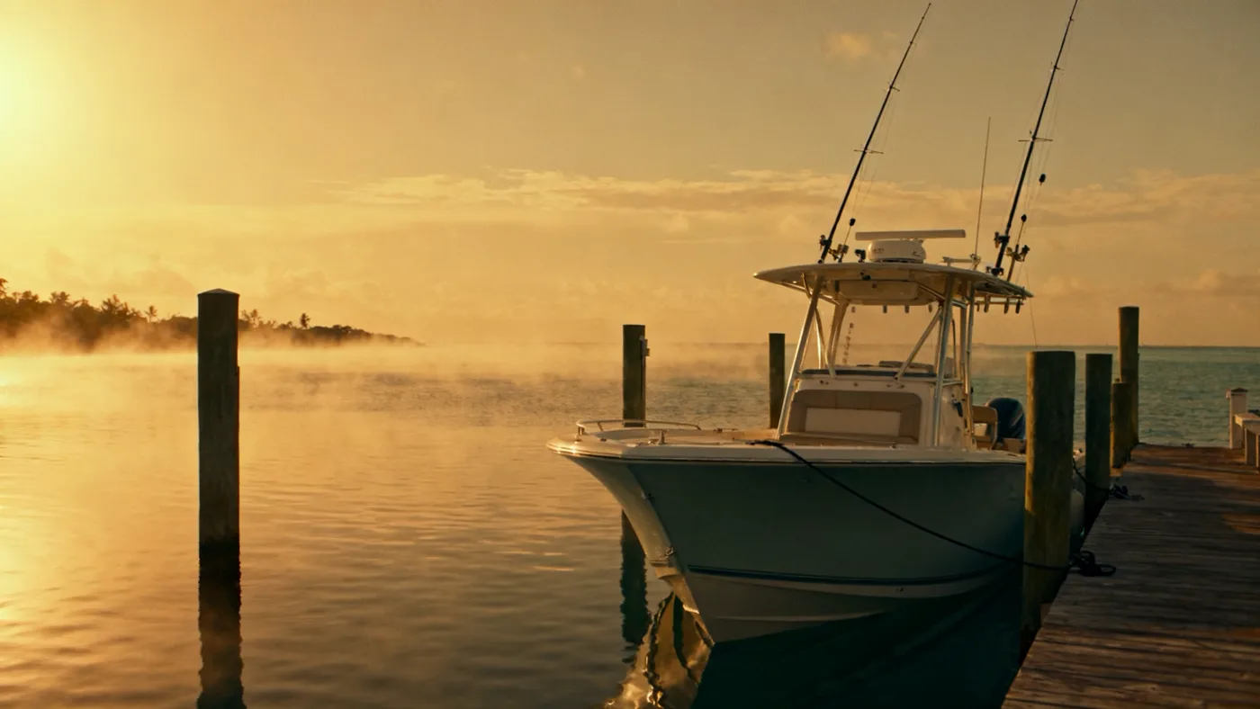 Center console charter boat at the Islamorada dock at dawn, ready for a half day trip